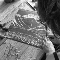 Emily Brooks carving a lino block Emily Brooks carving a lino block