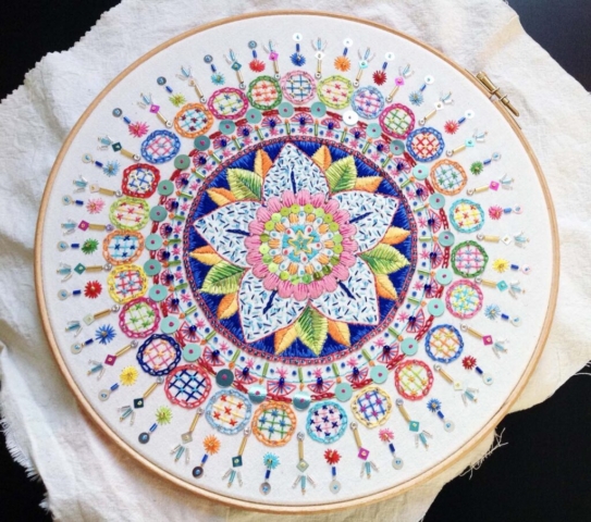 Mandala, hand embroidery on unbleached calico. Silks, beads, sequins.